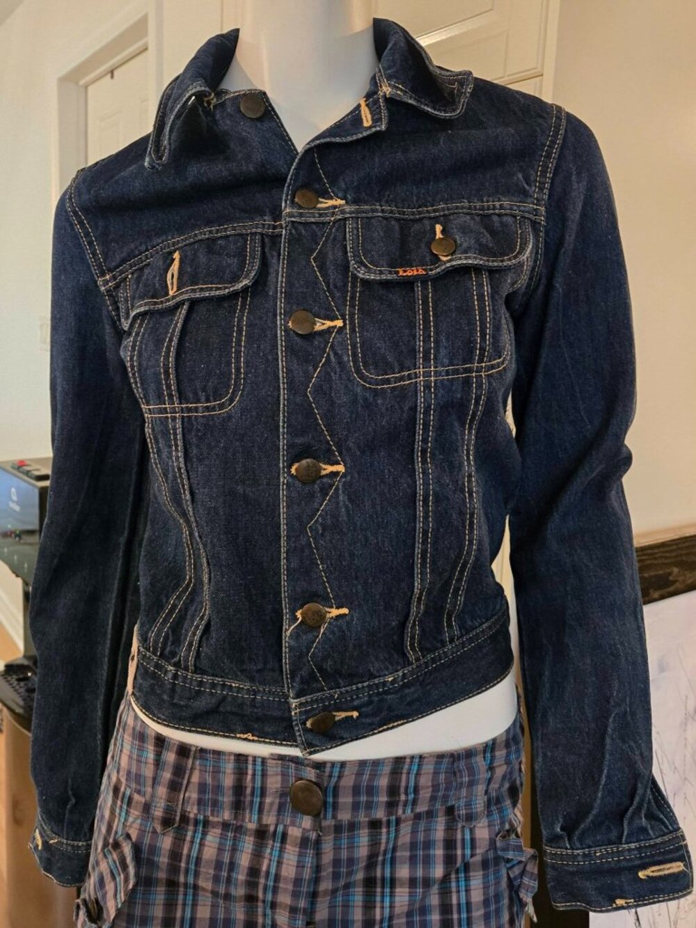 Men's denim jacket; it's marked European size 44, which corresponds to a men's e
